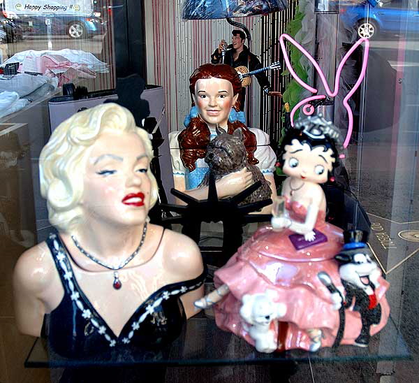 Icons in window of Hollywood souvenir shop, Marilyn Monroe, Betty Boop, Dorothy and Elvis (as a lamp)