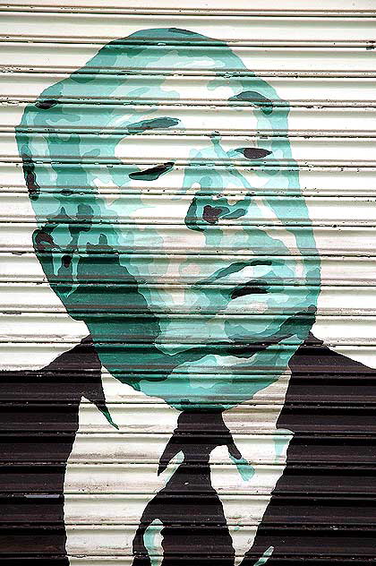 Alfred Hitchcock graphic on roll-up door, Hollywood Boulevard