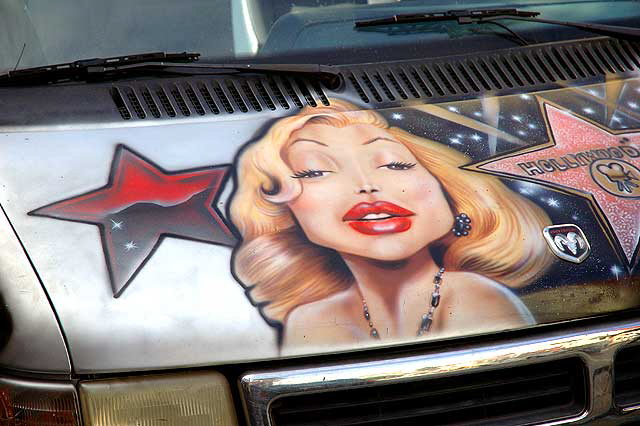 Marilyn Monroe graphic on the hood of a tour bus, Hollywood Boulevard