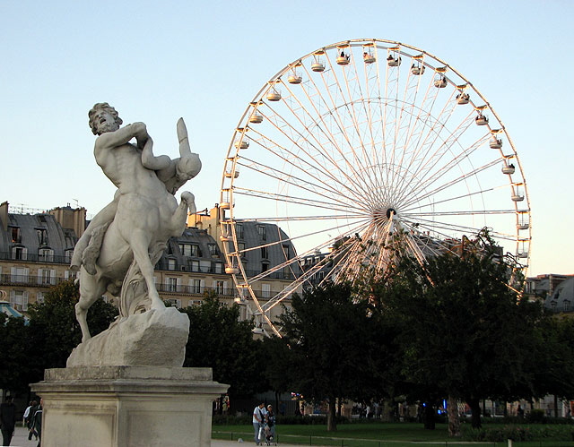 Summer 2007 - amusement park set up on the grounds of the Louvre in Paris, at sundown, Ferris wheel