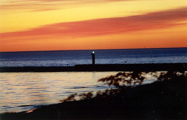 Dusk burns on the harbor channel - 