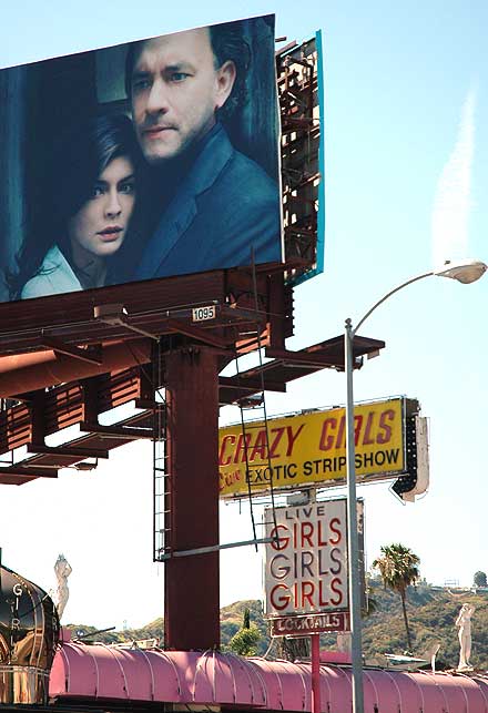 Da Vinci Code billboard on La Brea,  strip joint 