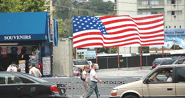 Flag and tourists on Hollywood Boulevard 