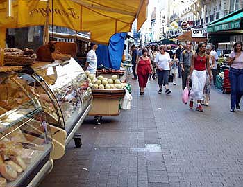 Paris street market - cheese stalls -