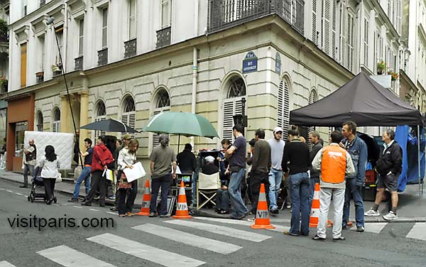 Paris street scene with mattress (filming)