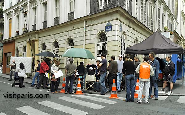 Paris street scene with mattress (filming)