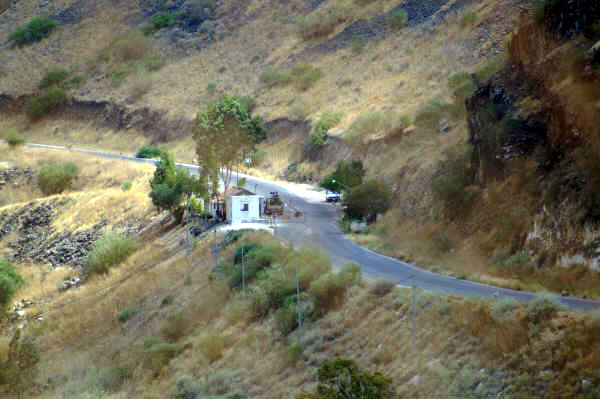 On the other side of the fence, a Syrian post