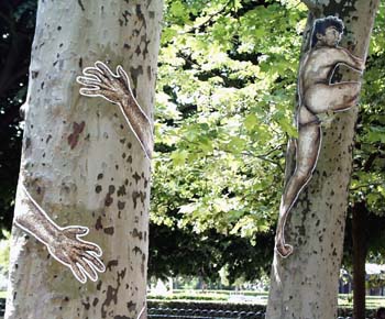 Paris park with surreal men in trees,,,,